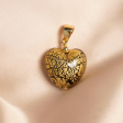 Dije en oro amarillo de 18K corazón negro con dorado Online