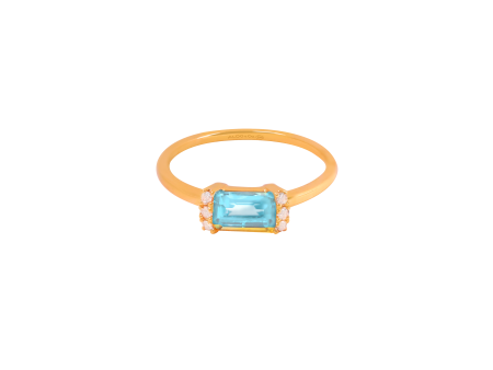 Anillo oro amarillo de 18K con topacio azul corte esmeralda For Sale