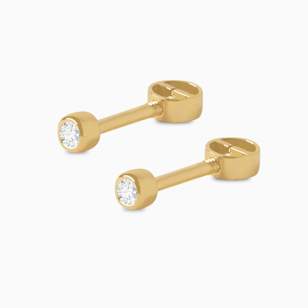 Aretes en oro amarillo de 18K punto de luz con brillante biselado Fashion