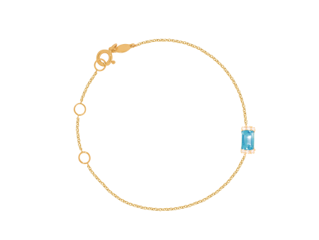 Pulsera en oro amarillo de 18K con topacio azul corte esmeralda on Sale