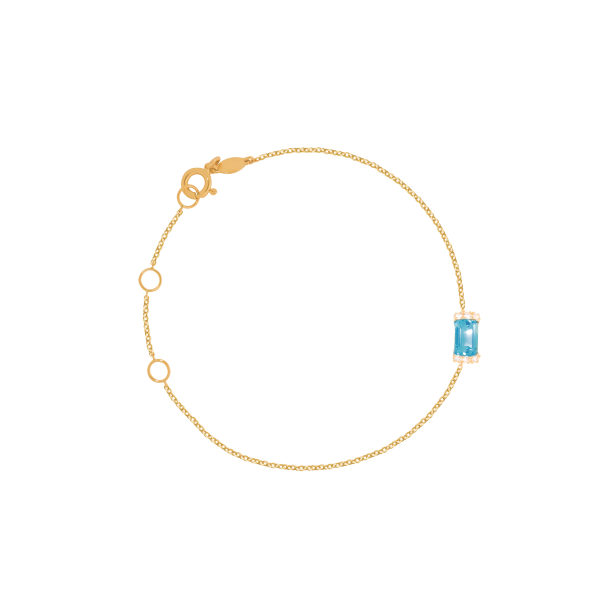 Pulsera en oro amarillo de 18K con topacio azul corte esmeralda on Sale