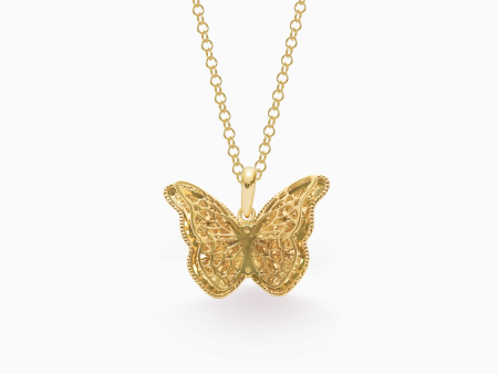 Dije en oro amarillo de 18K mariposa voladora Fashion