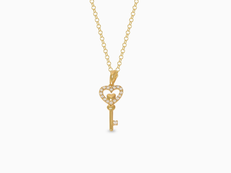 Dije en oro amarillo de 18K llave corazón con brillantes Online now